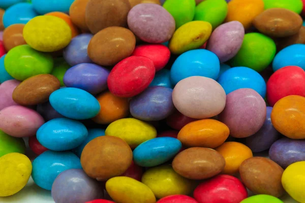 Kleurrijke snoepjes achtergrond — Stockfoto