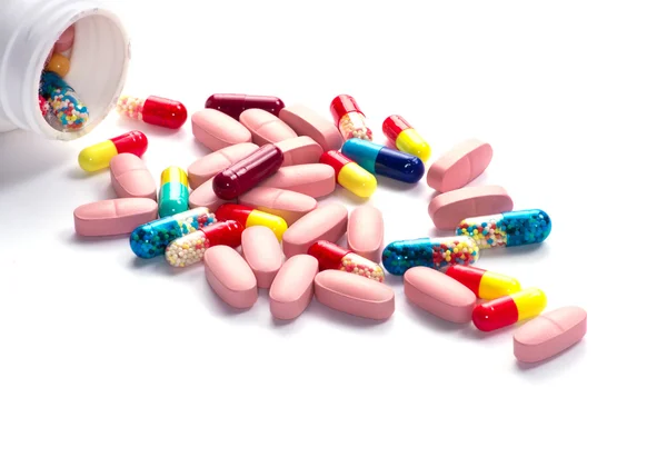 Colorful pills and bottle — Stock Photo, Image