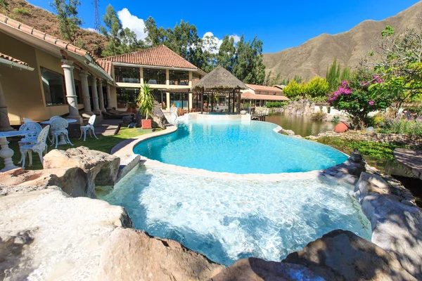 Luxury pool with decorative garden — Stock Photo, Image