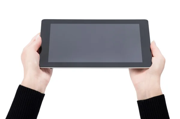 Händer som håller en tablett — Stockfoto