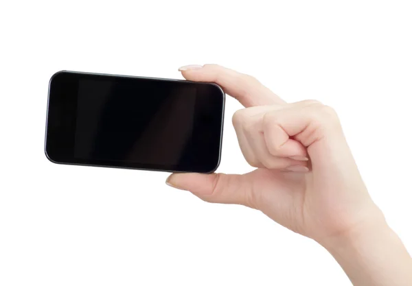 Cellulare in mano femminile — Foto Stock