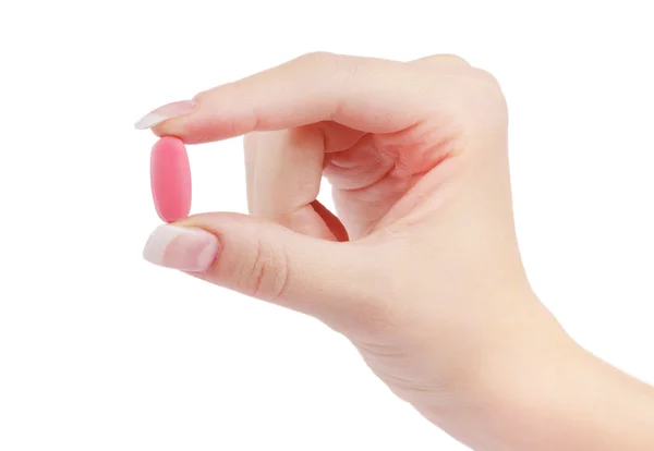 Medical pill in female hand — Stock Photo, Image