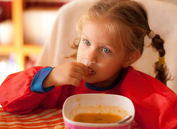 The little girl eating — Stock Photo, Image