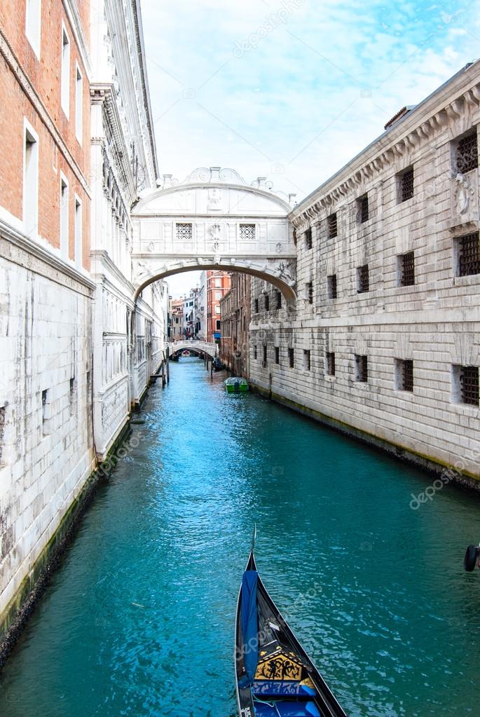 The Bridge of Sighs in Venice Italy passes over the Rio de Palazzo and connects the new prison to the old prison and interrogation rooms within the Doge's Palace.