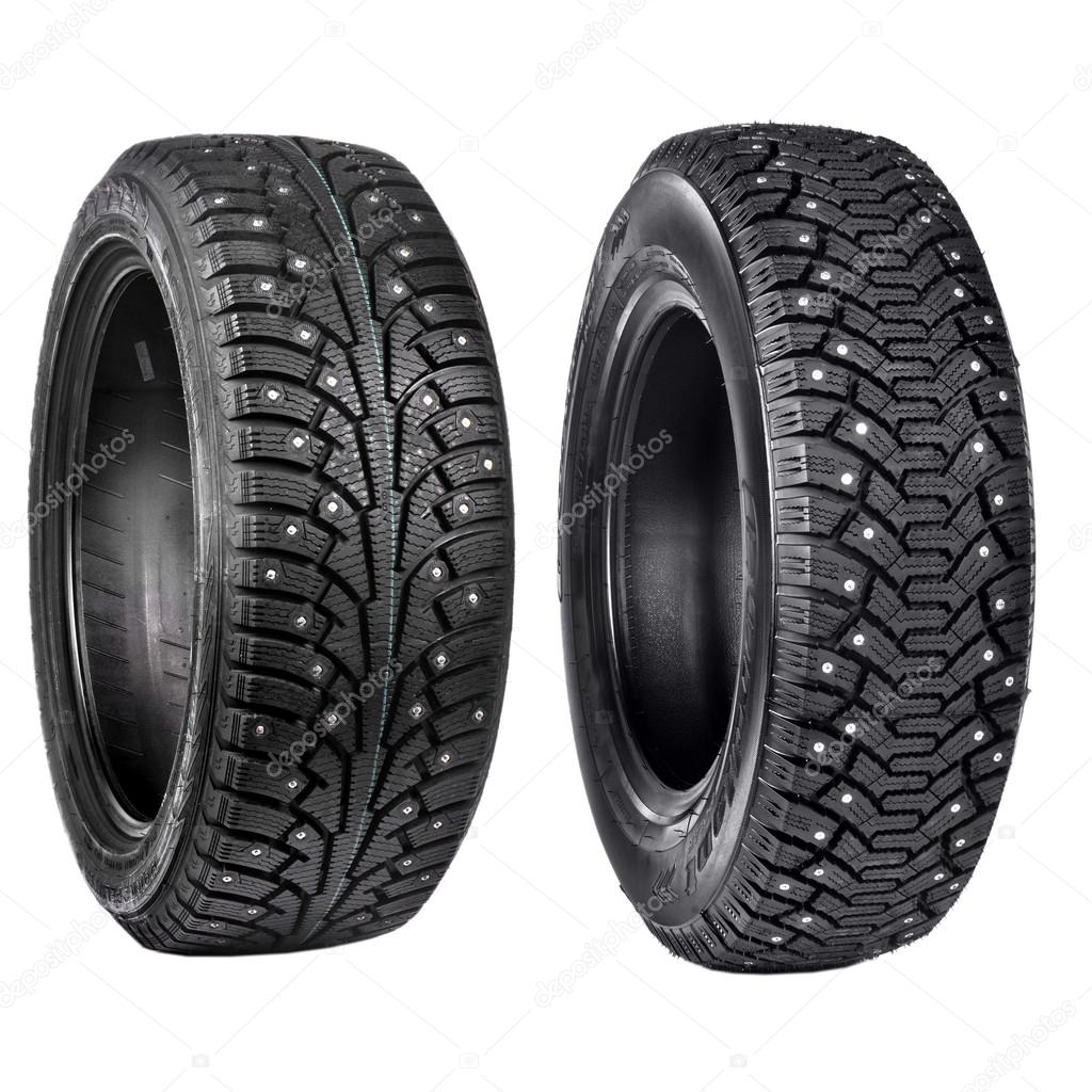 new black tyres for winter car driving isolated on white backgro