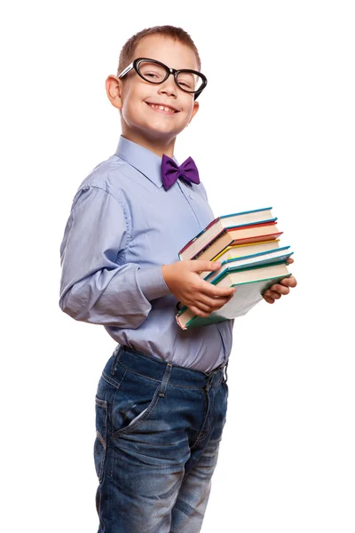 Niño feliz con libros aislados sobre fondo blanco — Foto de Stock