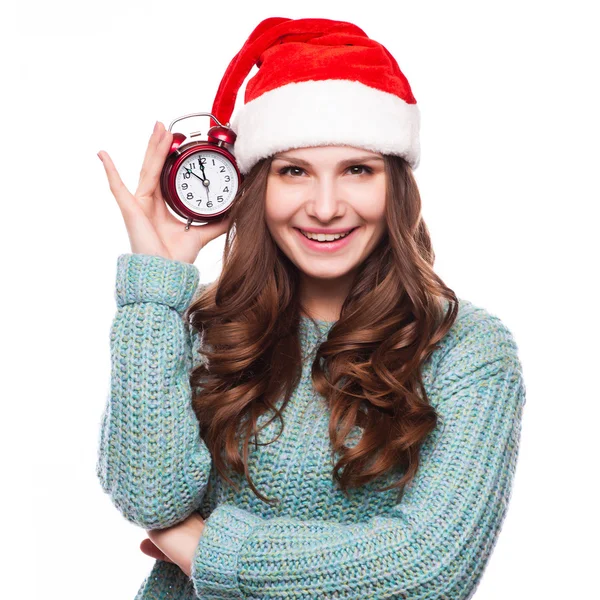 Pelirroja en sombrero de Navidad con reloj —  Fotos de Stock