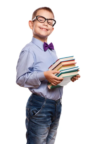 Niño feliz con libros aislados sobre fondo blanco —  Fotos de Stock