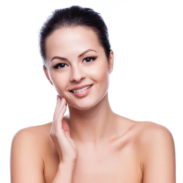 güzel bir genç kadın beyaz üzerine onun face.fresh sağlıklı skin.isolated dokunmadan