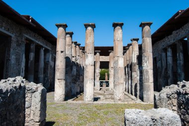 Pompeii is a ruined and partially buried Roman town-city near modern Naples in the Italian region of Campania, in the territory of the comune of Pompei..