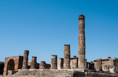 Ruins of the Temple of Zeus in the hole in Pompeii. Pompeii was destroyed, during a eruption of the volcano Mount Vesuvius spanning two days in 79 AD.