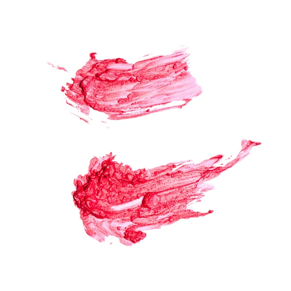 Rozmazana czerwona szminka odizolowana na białym tle — Zdjęcie stockowe