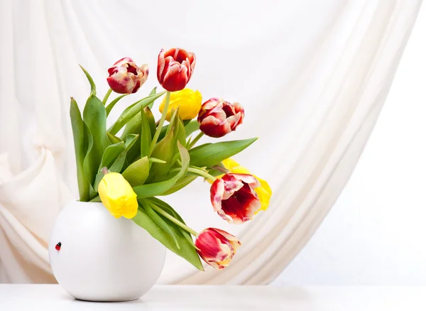 Bouquet of colorful tulips in vase — Stock Photo, Image