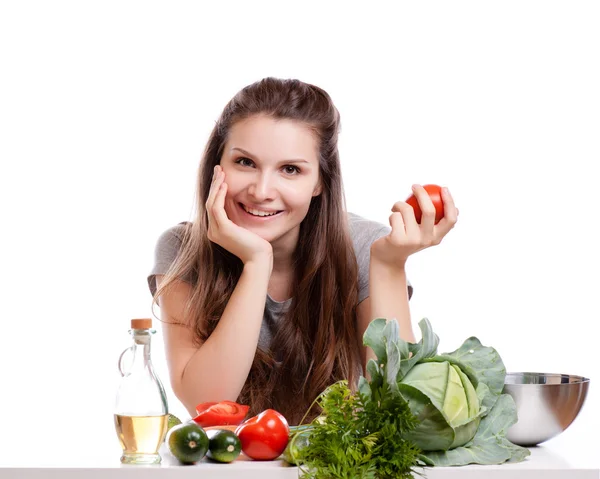 Young Woman Cooking in the kitchen. Healthy Food - Vegetable Salad. Diet. Dieting Concept. Healthy Lifestyle. Cooking At Home. Stock Picture