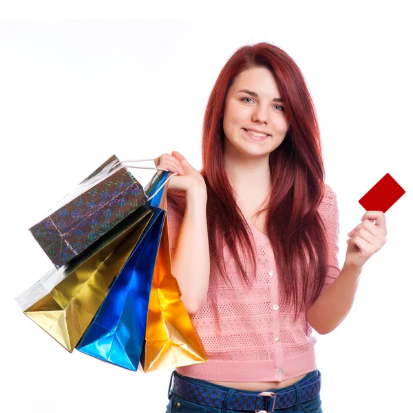 Mujer de belleza con bolsas de compras en el centro comercial . — Foto de Stock