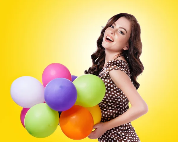 Attractive elegant woman with balloons — Stock Photo, Image