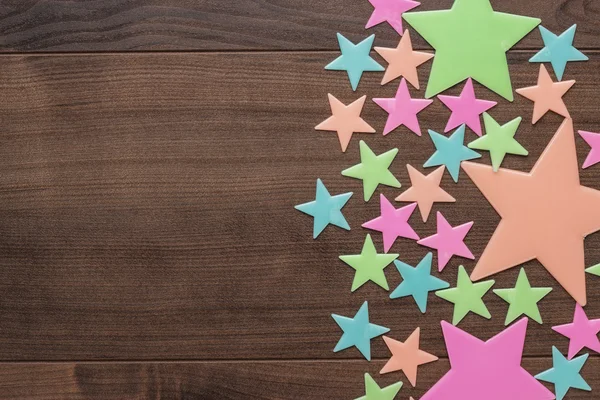 Plastic toy stars on the table — Stock Photo, Image