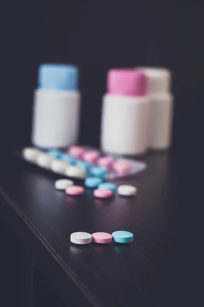 Colorful pills on the table — Stock Photo, Image