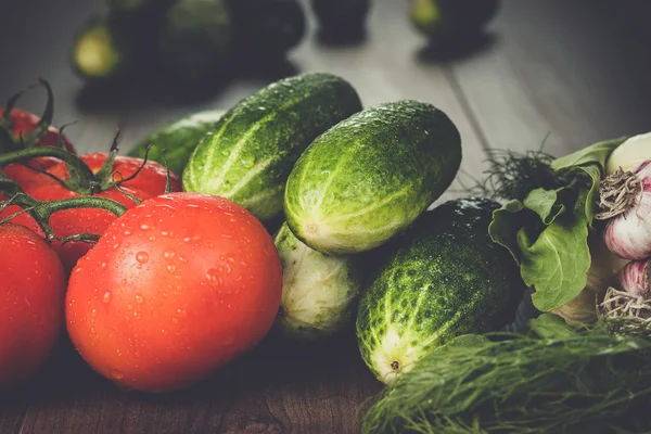 Fresh vegetables on brown wooden table — Stock Photo, Image