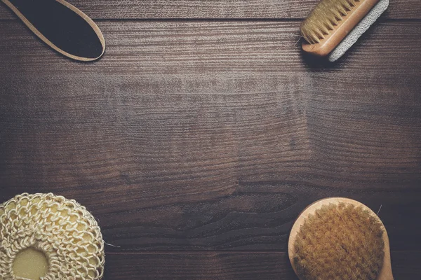 Some bath accessories over wooden background — Stock Photo, Image