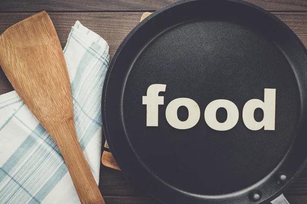 Frying pan with word food — Stock Photo, Image