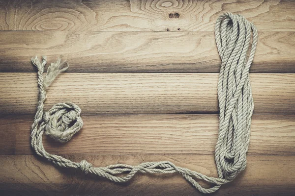 Antiguo fondo de madera con cuerda de barco — Foto de Stock
