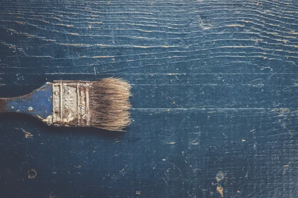 Old brush on the table — Stock Photo, Image