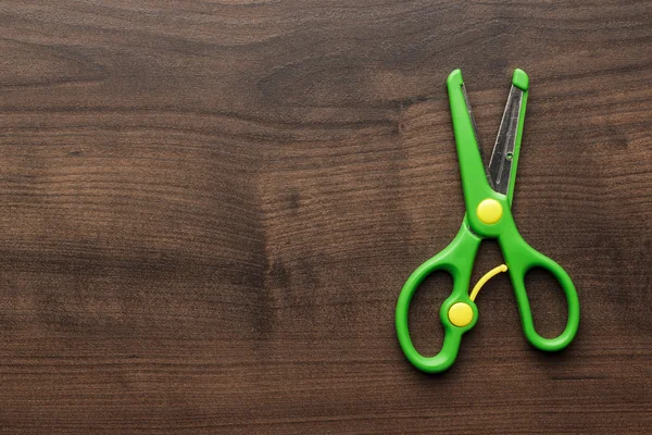 Childrens scissors on the table — Stock Photo, Image