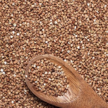 kahverengi tahta kaşıkla buğday