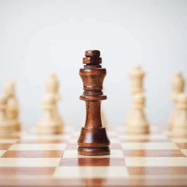 Chess concept on grey background — Stock Photo, Image