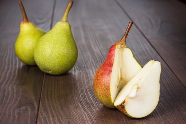 Fresh pears on wooden table — Stock Photo, Image