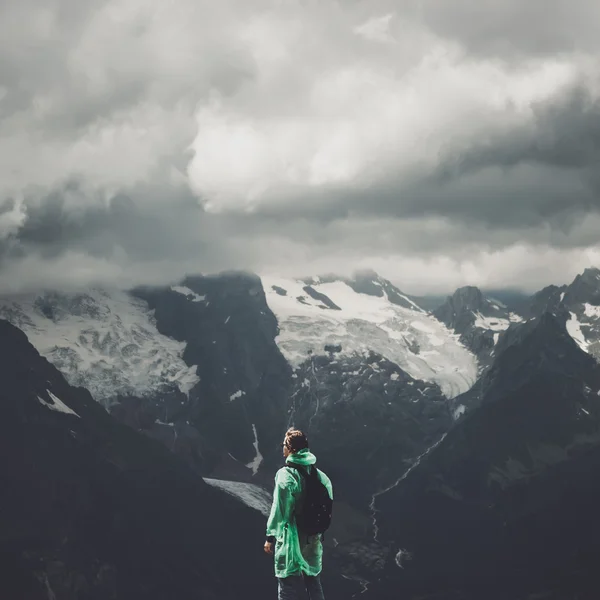 Male traveller and summer mountain stormy landscape — Stock Photo, Image