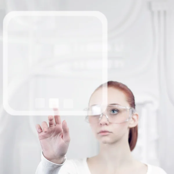 Woman working with futuristic interface — Stock Photo, Image