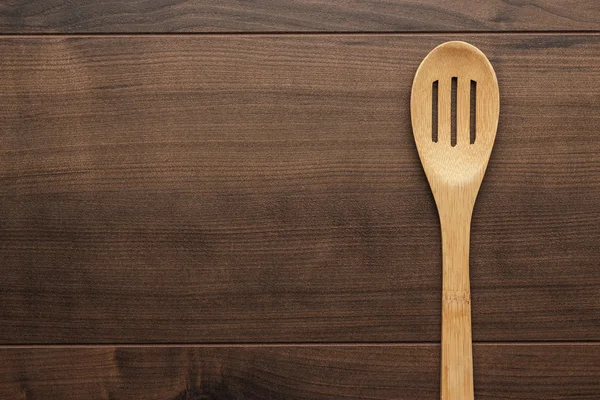 Skimmer de madera en la mesa — Foto de Stock