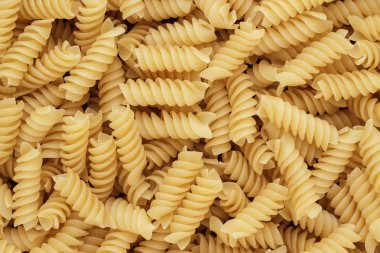 Kuru pişmemiş rotini doku arka plan Close-Up