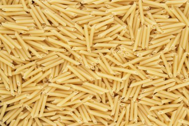 Kuru pişmemiş penne lisce makarna doku arka plan