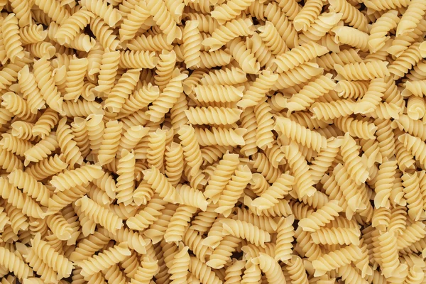 건조 하지 않은 rotini 질감 배경 — 스톡 사진