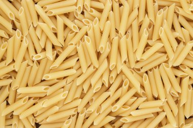 Kuru pişmemiş penne makarna doku arka plan