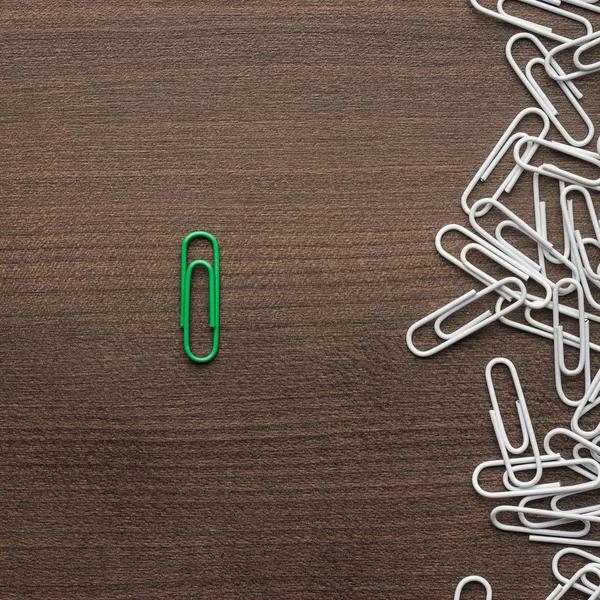 bright green paper clip concept