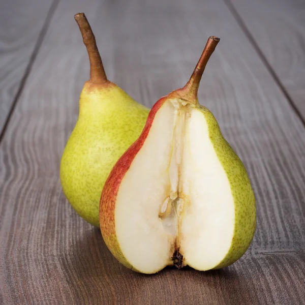 Fresh pears on wooden table — Stock Photo, Image