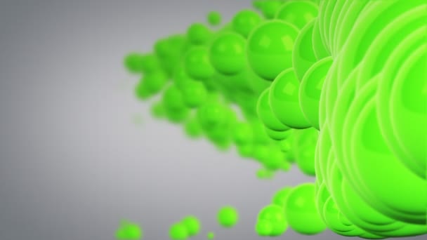 Moving green spheres abstract background loop — Stock Video