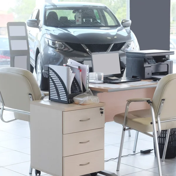 Working place of managers in a dealer's car showroom