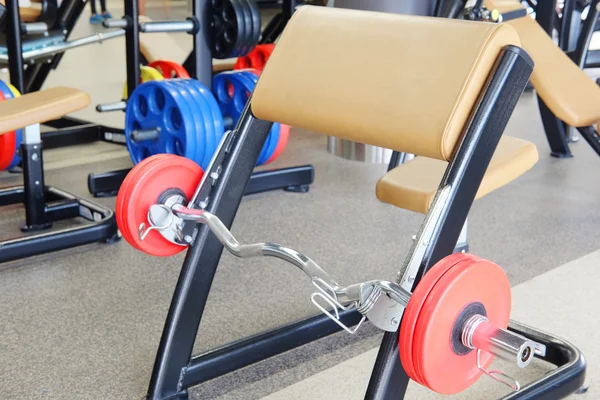 Barbell and gym bench — Stock Photo, Image