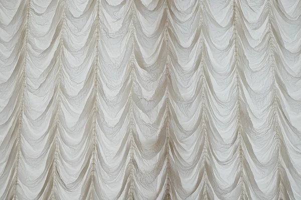 Bakgrund med en konsistens av gardiner — Stockfoto