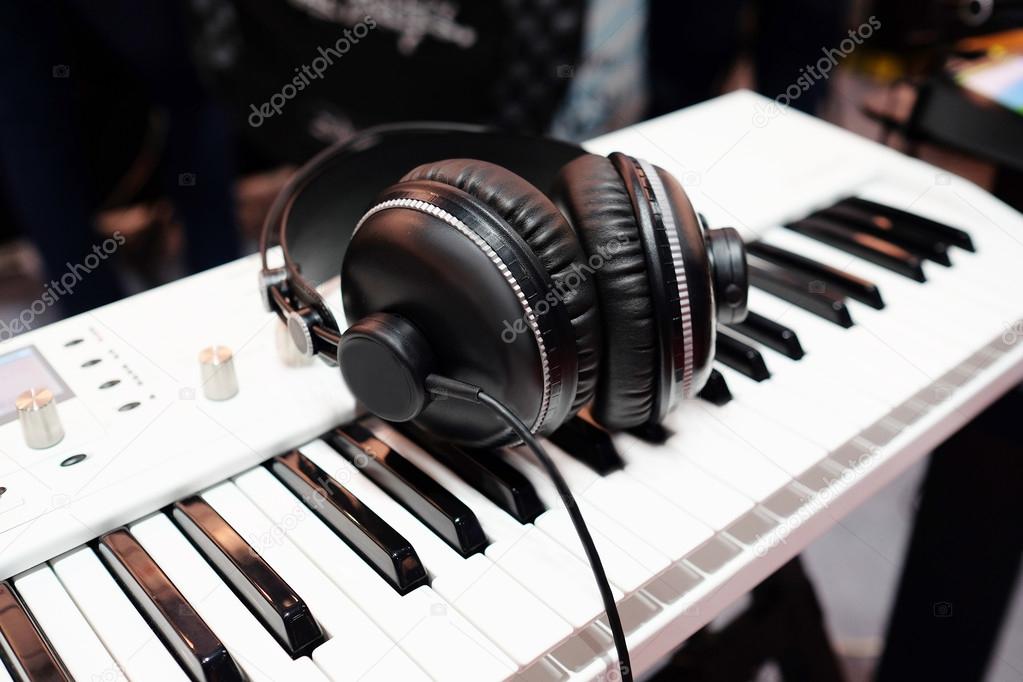 synthesizer and headphones