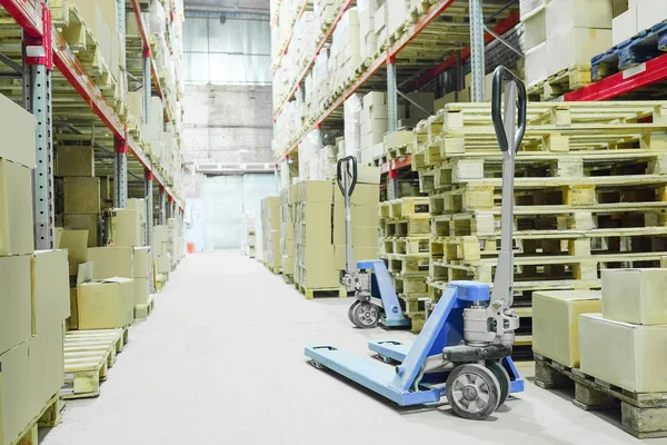 Loader on big warehouse — Stock Photo, Image