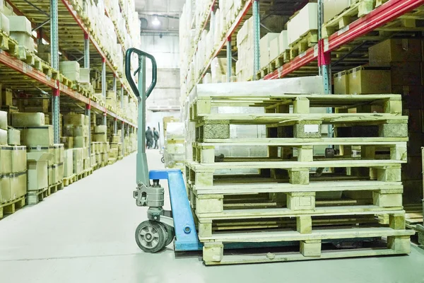 Loader on big warehouse — Stock Photo, Image