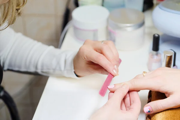 Woman doing a manicure — Stock Photo, Image