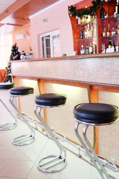 Chairs in row in bar — Stock Photo, Image