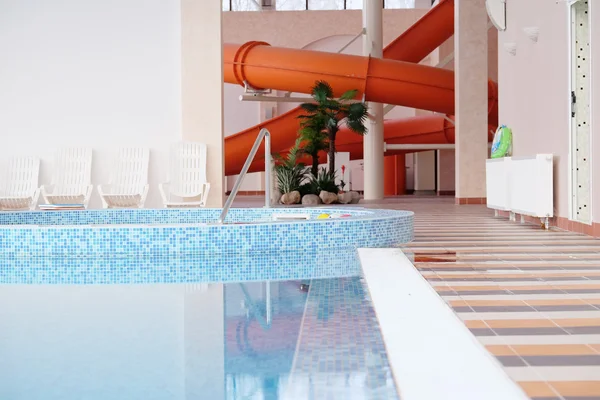 Swimming pool and aqua park in a resort hotel — Stock Photo, Image